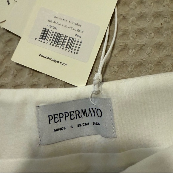 PepperMayo white sequins shell mini skirt
BRAND NEW, no issues just too tight - Picture 3 of 4